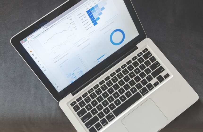 A newsletter analytics dashboard on a laptop.