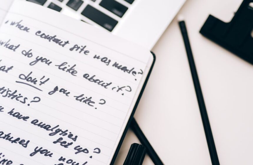 Newsletter welcome sequence notes beside a laptop.