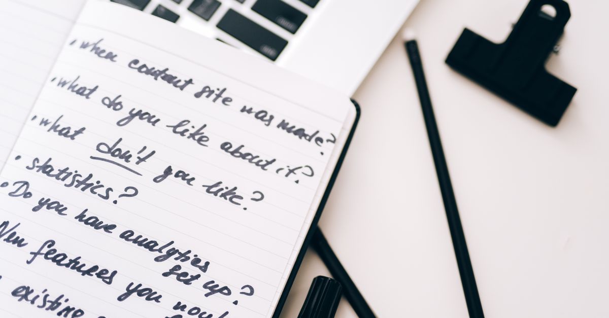 Newsletter welcome sequence notes beside a laptop.