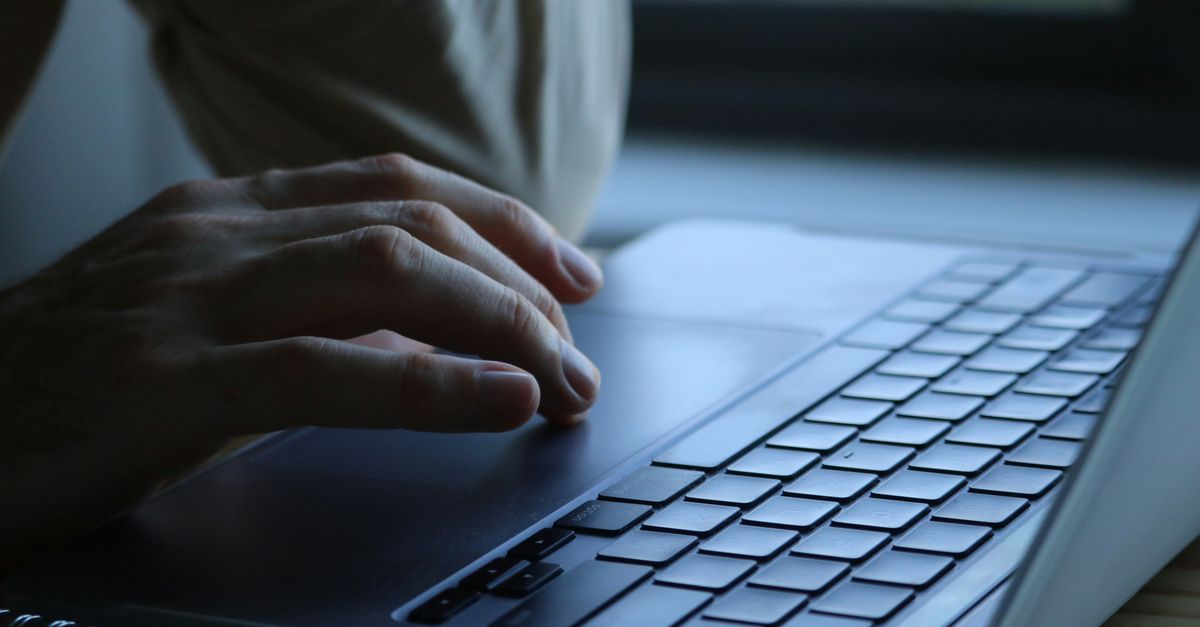 A laptop showing email preferences beside a checklist.